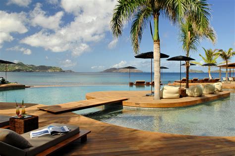 Hotel christopher saint barth - Suite Piscine. Suite Piscine Le Sereno’s ultra luxurious one-bedroom villas are located on the hillside, providing total privacy. 390 sq ft / 36 sq m as well as 970 sq ft wooden deck. View